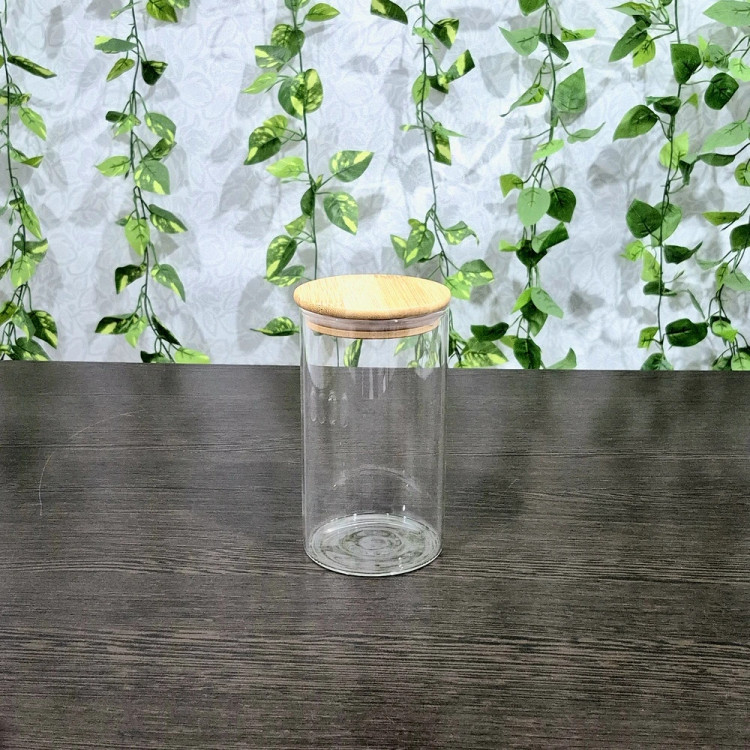 بانکه پیرکس گرد درب بامبو قطر ۸/۵ ارتفاع ۸،۱۰،۱۲،۱۵ و ۲۰ سانتیمتر Round Pyrex Storage Jar with Bamboo Lid — Diameter 8.5 cm, Heights 8, 10, 12, 15, and 20 cm